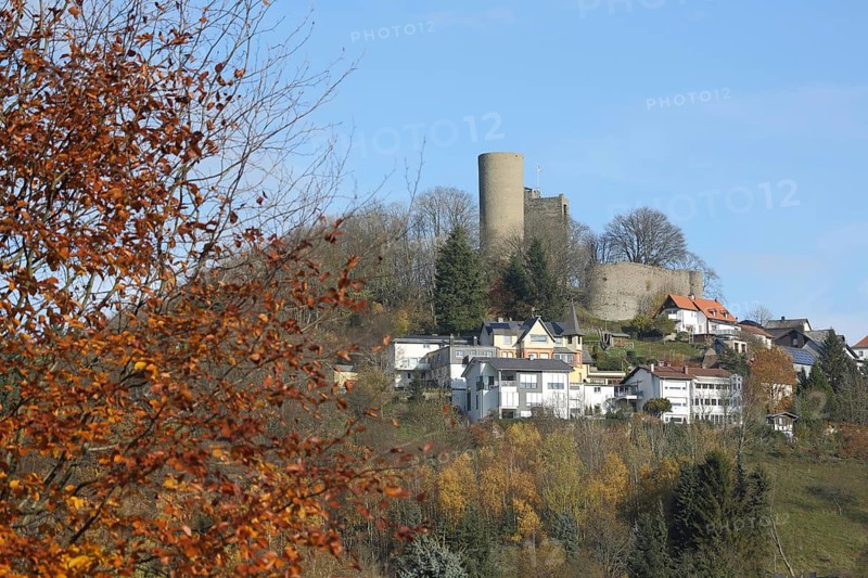 View of Oberreifenberg townscape with castle in autumn, Schmitten, Taunus, Hesse, Germany, Europe