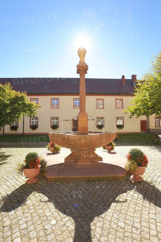 Fountain in the inner courtyard with backlight, Church of the Assumption of the Virgin Mary, St. Märgen, Southern Black Forest, Black Forest, Baden-Württemberg, Germany, Europe