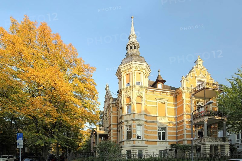 Historicist villa built in 1897 with corner turrets and decorations, tree, autumn atmosphere, turret, bay window, Lessingstrasse, Wiesbaden, Hesse, Germany, Europe