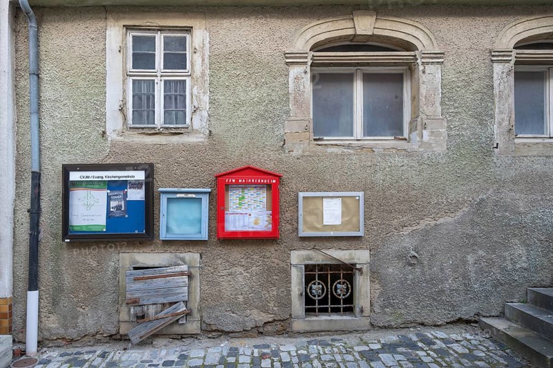 Information boxes on a vacant former inn from 1823, Herrenstr. 35, Mainbernheim, Lower Franconia, Bavaria, Germany, Europe