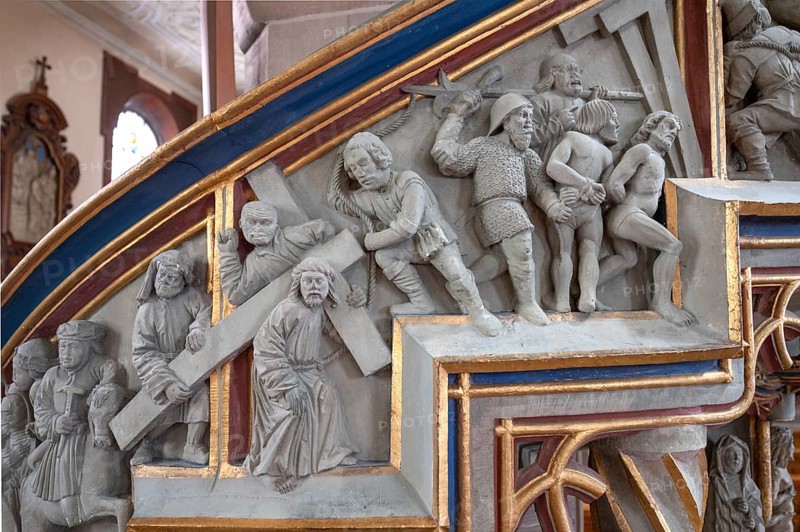 Relief on the pulpit of Jesus' Way of the Cross with the two thieves, Heilig-Kreuz-Münster, Rottweil, Baden-Württemberg, Germany, Europe