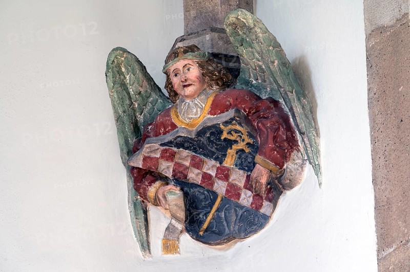 Angel with abbot's staff and the coat of arms of the Cistercians of Bebenhausen Abbey, console stone in St Martin's Church, Plieningen, Baden-Württemberg, Germany, Europe