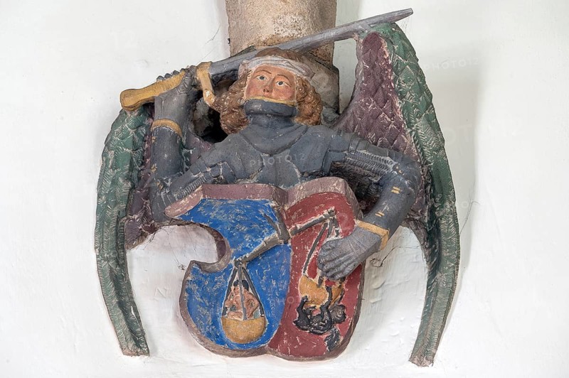 Archangel Michael with soul scales and sword, console stone in St Martin's Church, Plieningen, Baden-Württemberg, Germany, Europe