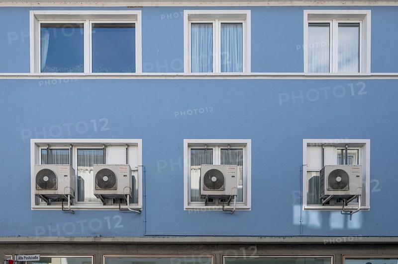 Air conditioning units outside the window of an apartment block, Kitzingen, Unterfanken, Bavaria, Germany, Europe
