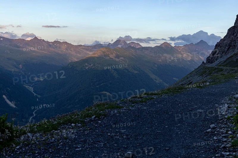Panorama trail in the evening, Flüela Pass road and Grisons Alps in the background, Parsenn, Davos, Grisons, Switzerland, Europe