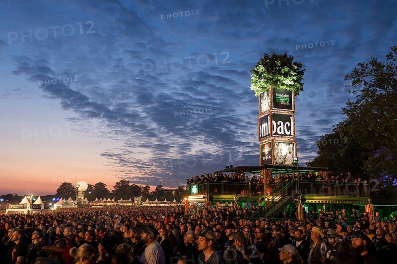 Tower of the sponsor Krombacher at dusk at the Wacken Open Air in Wacken. The traditional metal festival takes place from 31 July to 3 August 2024