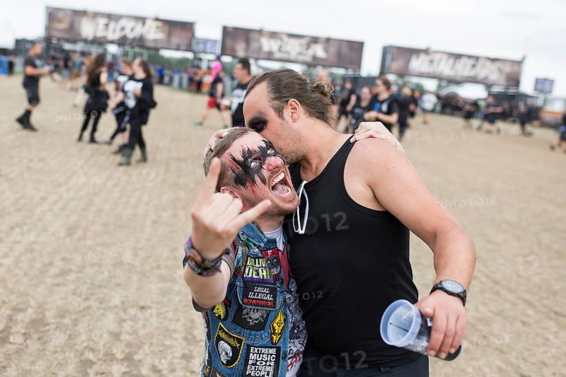 Festival visitors Julian and Markus in front of the entrance area at the Wacken Open Air in Wacken. The traditional metal festival takes place from 31 July to 3 August 2024