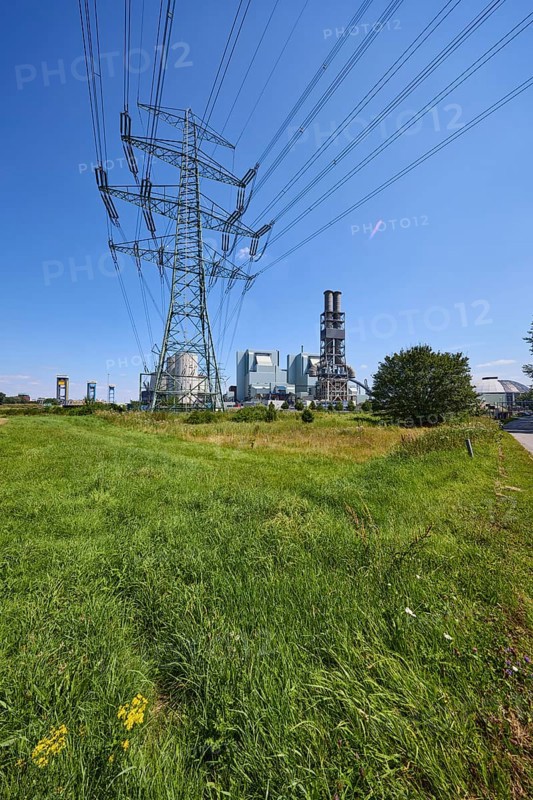 Moorburg coal-fired power station with high-voltage pylon against a cloudless blue sky in the district of Moorburg, Free and Hanseatic City of Hamburg, Hanseatic city, independent city, federal state of Hamburg, Germany, Europe