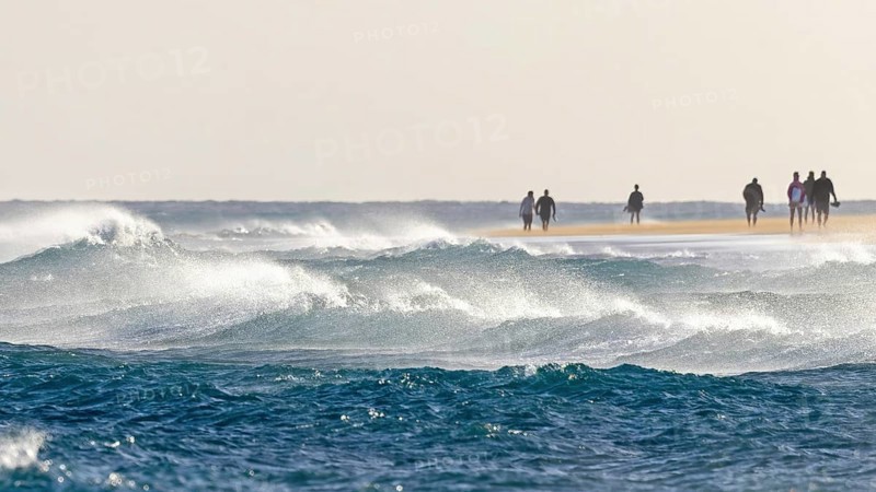 Destination Spain, swimming in the sea, travel, holidays, sun and fun on the beach, white sandy beach, cool wind, holiday feeling, hiking by the sea, waves, stormy weather, Playa del Matorral, bathing fun, relaxation, peace and nature, Fuerteventura, Spain, Europe