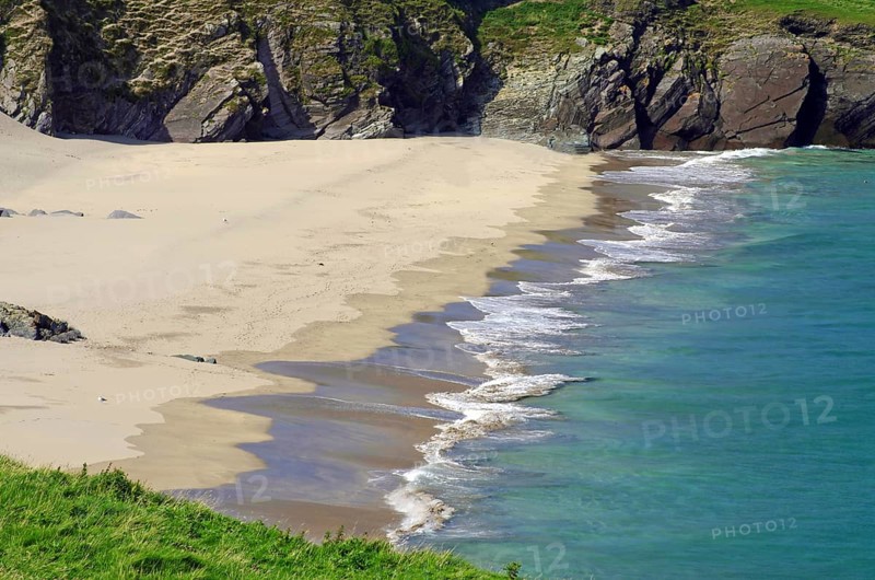 Calm sandy beach with shallow water and small waves, Blasket Islands, Dunmore Head, Ireland, Europe