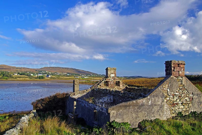 Stone ruins overlooking a bay and the sea, Achill Island, County Mayo, Ireland, Europe