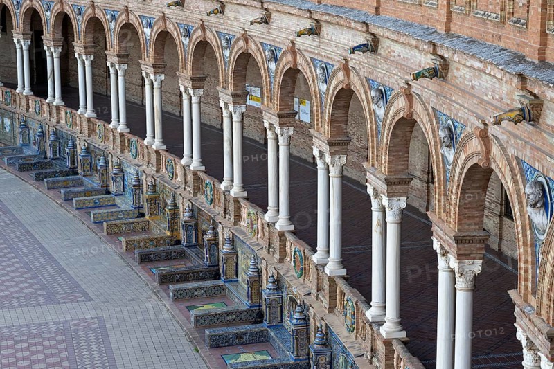 Colonnade and tiled benches of the pavilion at the Plaza de Espana in Seville, Andalusia, Spain, Europe