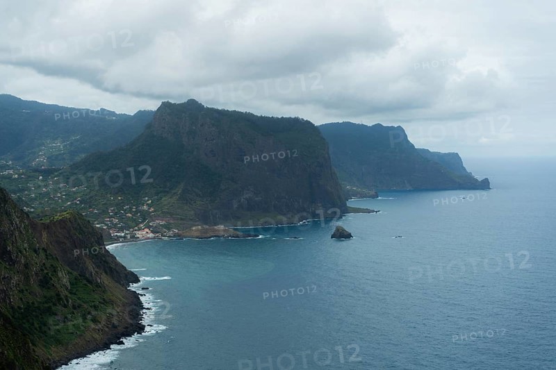 Penha d'Aguia Mountain on Cloudy Day and Ocean. Vereda do Larano. Madeira, Portugal, Europe
