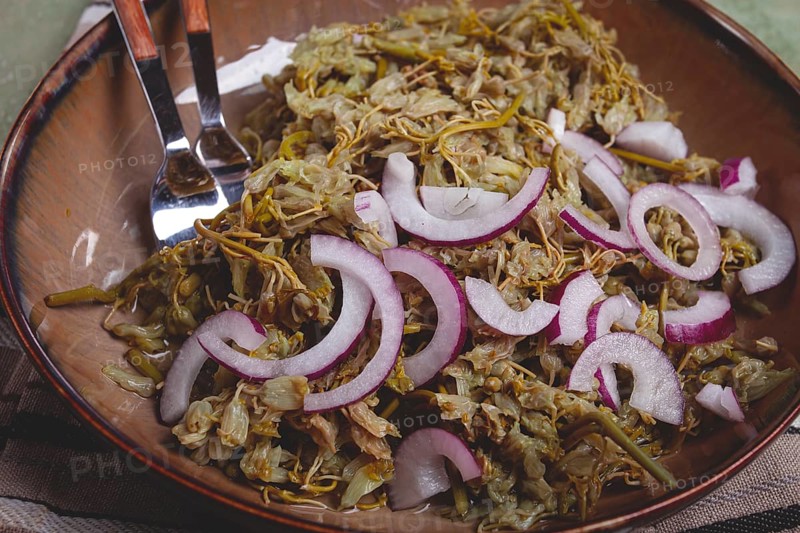 Jonjoli, Colchian klekachka, jonjoli salad, with red onion and butter, Georgian appetizer, pickled jonjoli, no people
