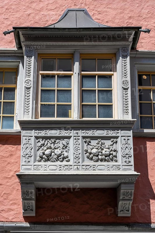 Artfully decorated bay window, stonemasonry work on a historic town house in the monastery quarter, historic old town of Sankt Gallen, Canton of St. Gallen, Switzerland, Europe