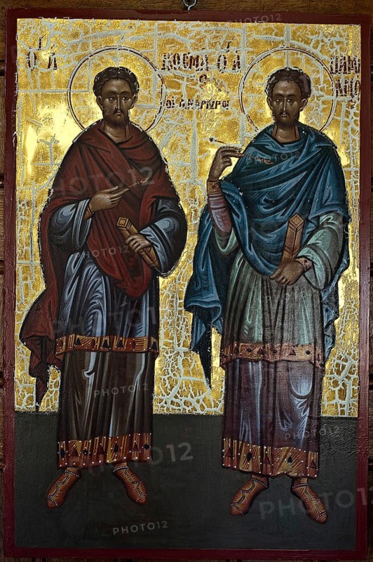 Painting representing Cosmas and Damian at the Sts Anargyroi church in Nairobi Kenya . Cosmas and Damian were two christian martyrs from the 3rd century AD. They were known for practising medicine and surgery for free