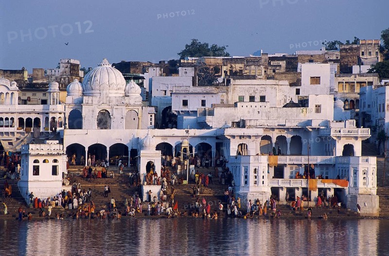 Ghats at Pushkar (Rajasthan, India), Hindu devotees are bathing in the holy lake. Pushkar is the main hindu pilgrimage site in the state of Rajasthan