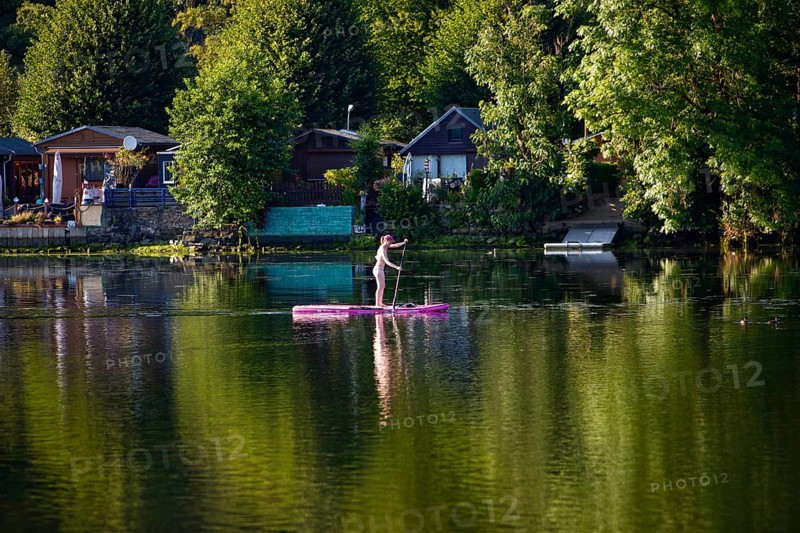 Panorama Hengsteysee with stand-up paddler in front of allotment gardens on the shore, Hagen, North Rhine-Westphalia, Germany, Europe