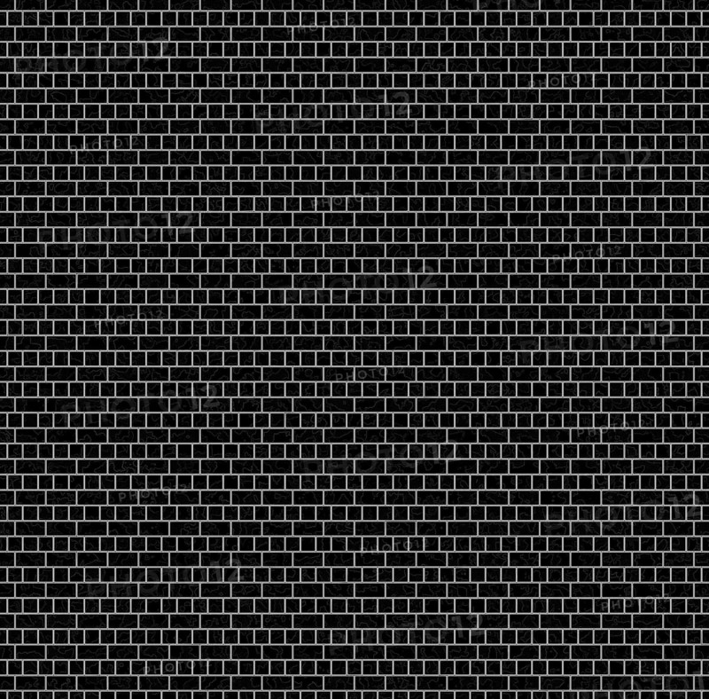 A monochrome image of a brick wall with black bricks and white mortar, creating a geometric and repetitive pattern