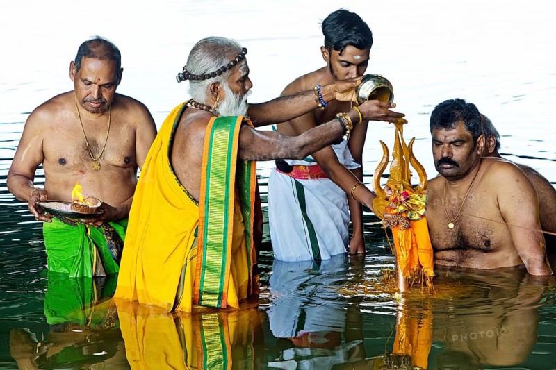 Head priest Siva Sri Arumugam Paskarakurukkal in the Datteln-Hamm canal during ritual purification, Hamm, Ruhr area, Germany, Europe