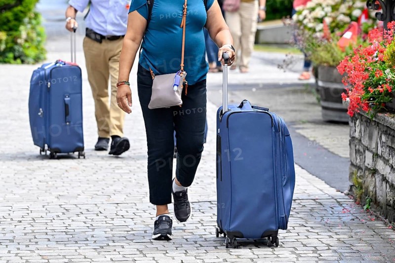 Woman with trolley case