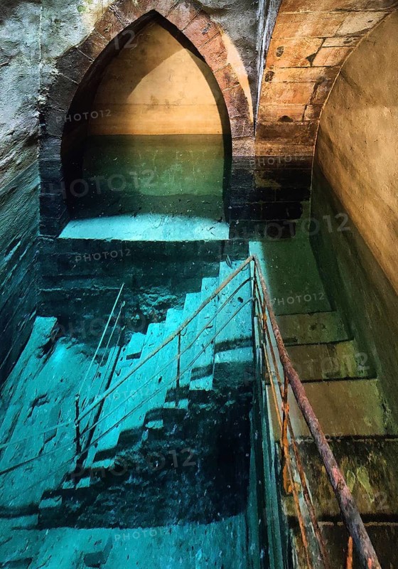 According to the inscription, the historic mikvah was built in 1260, the shaft is 25 metres deep and reaches the groundwater, Friedberg, Hesse, Germany, Europe