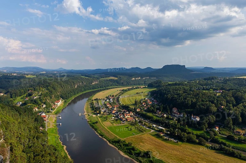 The Bastei is a rock formation with a viewing platform in Saxon Switzerland on the right bank of the River Elbe in the municipality of Lohmen between the spa town of Rathen and the town of Wehlen. It is one of the most visited tourist attractions in Saxon Switzerland. View into the Elbe valley to the Lilienstein, Saxon Switzerland, Rathen, Saxony, Germany, Europe