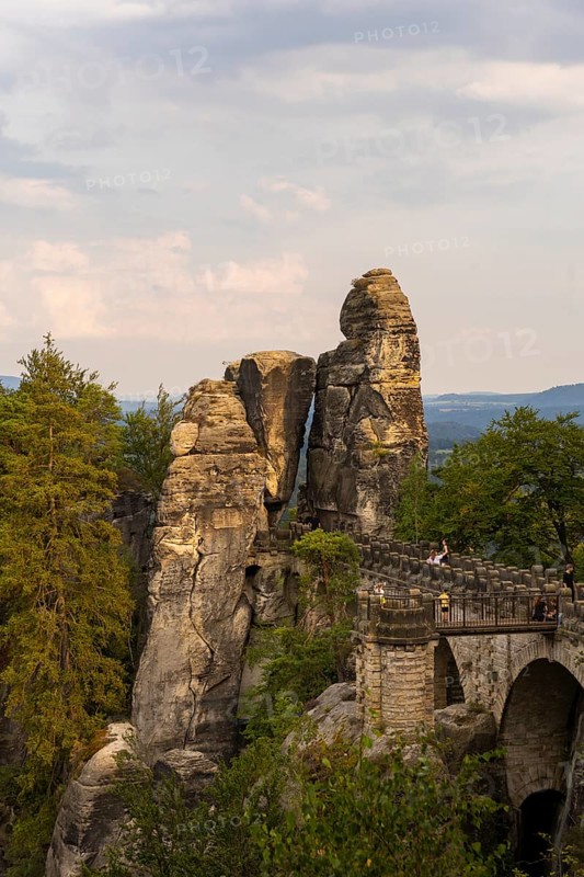 The Bastei is a rock formation with a viewing platform in Saxon Switzerland on the right bank of the River Elbe in the municipality of Lohmen between the spa town of Rathen and the town of Wehlen. It is one of the most visited tourist attractions in Saxon Switzerland. Bastei Bridge, Saxon Switzerland, Rathen, Saxony, Germany, Europe