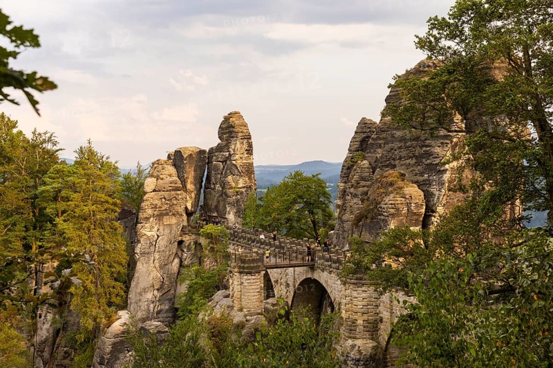 The Bastei is a rock formation with a viewing platform in Saxon Switzerland on the right bank of the River Elbe in the municipality of Lohmen between the spa town of Rathen and the town of Wehlen. It is one of the most visited tourist attractions in Saxon Switzerland. Bastei Bridge, Saxon Switzerland, Rathen, Saxony, Germany, Europe