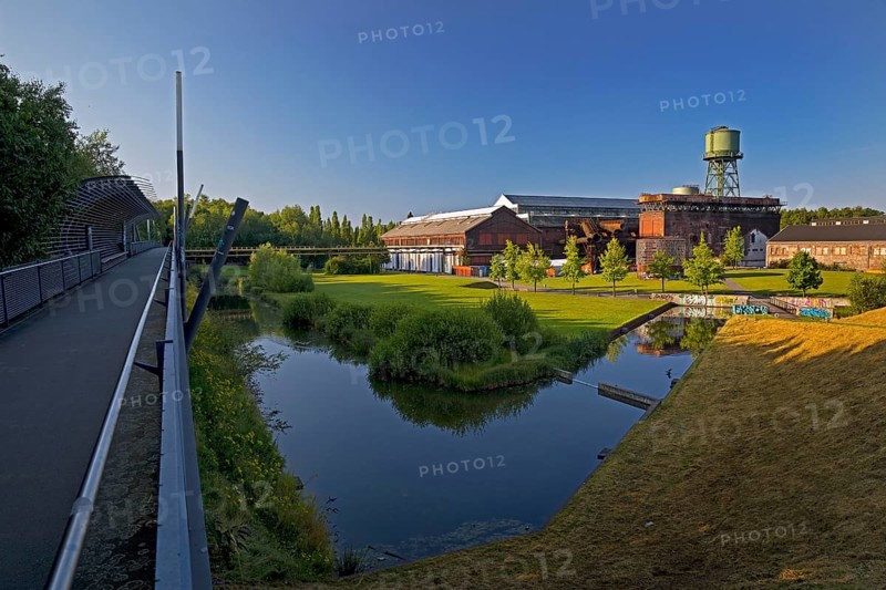 The footbridge with the water tower at the Jahrhunderthalle in Westpark, Bochum, Ruhr area, North Rhine-Westphalia, Germany, Europe