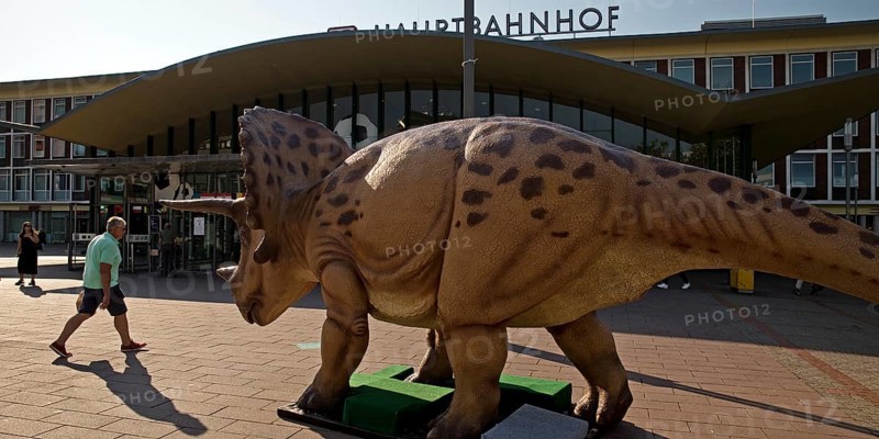 Triceratops model, three-horned dinosaur on the square in front of the main railway station, Dino City III, Bochum, Ruhr area, North Rhine-Westphalia, Germany, Europe