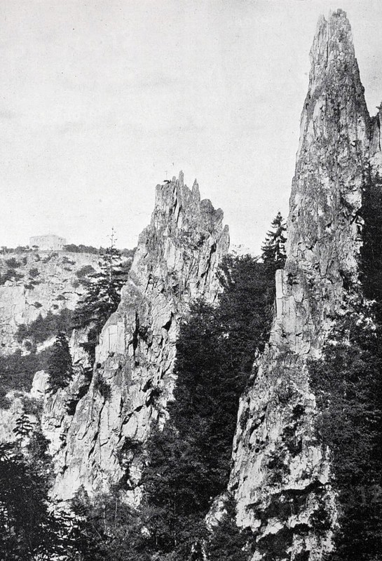 Steep and high rocks protrude from a wooded area, the Hexentanzplatz in the Harz Mountains, Germany, Historical, digitally restored reproduction from a 19th century original, Record date not stated, Europe