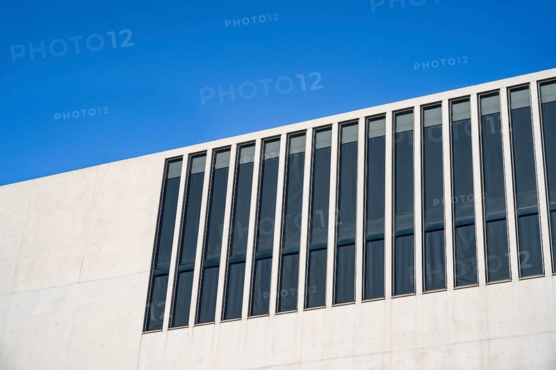 White façade with windows against a blue sky, NS Documentation Centre in the Kunstareal Munich, Munich, Bavaria, Germany, Europe