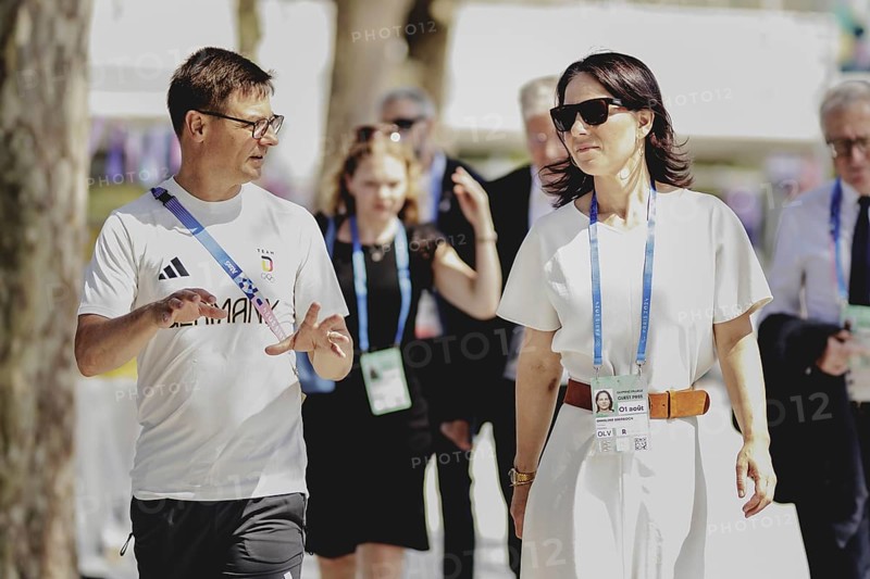 (R-L) Annalena Bärbock (Alliance 90/The Greens), Federal Foreign Minister, and Olaf Tabor, Head of Mission of the DOSB, pictured during the visit to the Olympic Games in Paris, 1 August 2024. Foreign Minister Bärbock is travelling to Paris for political talks and to visit the Olympic Games. /
