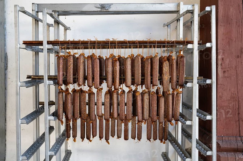 Smoked sausages traditionally produced by the monastery butchery, called Klostergibeli, hang to dry in the open air, Ittingen Charterhouse, Warth-Weiningen near Frauenfeld, Canton Thurgau, Switzerland, Europe