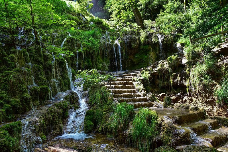 Waterfall at the Brühlbach stream in Bad Urach in the Swabian Alb, Baden-Württemberg, Germany, Europe