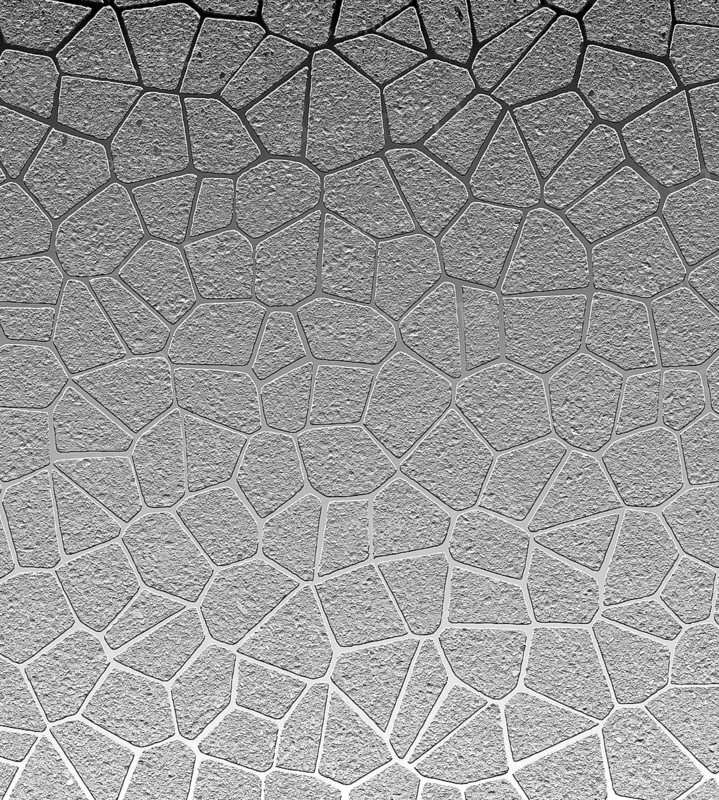 Abstract geometric pattern with textured gray shapes resembling a mosaic