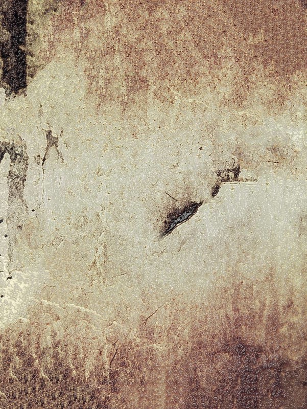 Abstract textured surface with shades of brown and beige creating a distressed and vintage atmosphere