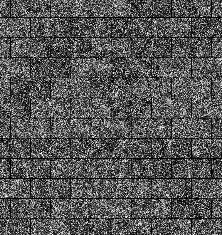 Grey textured roof shingles arranged in a repetitive pattern