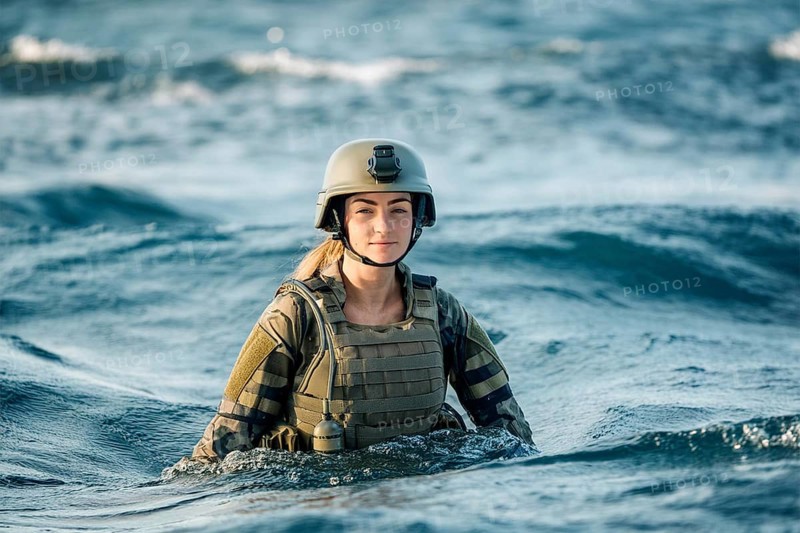 Soldier in uniform and helmet stands up to his chest in the sea, surrounded by waves, AI generated, AI generated