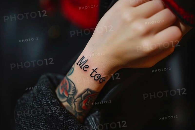 Close up of tattoo with text 'Me too' on woman's wrist. Generative AI, AI generated