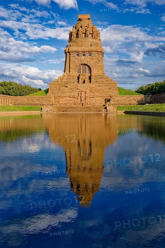 Monument to the Battle of the Nations in memory of the Battle of the Nations 1813 against Napoleon Bonaparte, cloudy mood, water reflection, Leipzig, Saxony, Germany, Europe