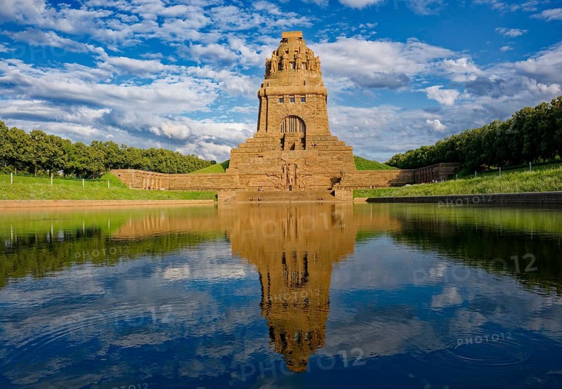 Monument to the Battle of the Nations in memory of the Battle of the Nations 1813 against Napoleon Bonaparte, cloudy mood, water reflection, Leipzig, Saxony, Germany, Europe