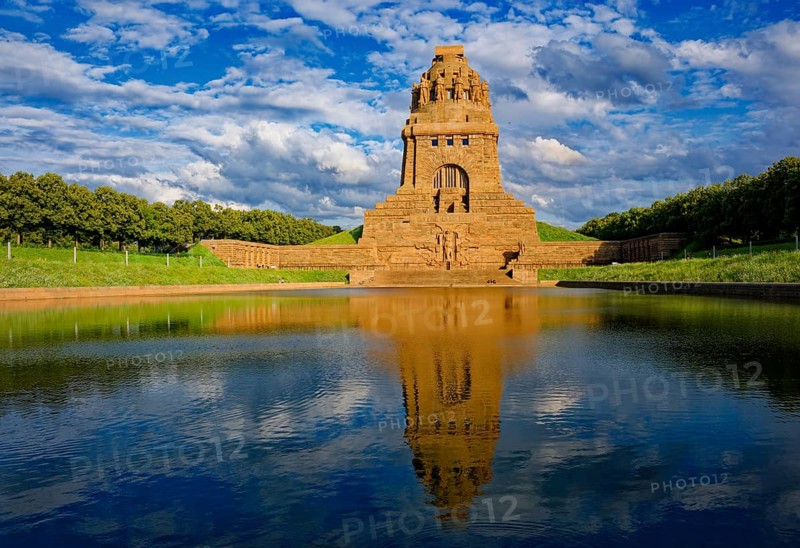 Monument to the Battle of the Nations in memory of the Battle of the Nations 1813 against Napoleon Bonaparte, cloudy mood, water reflection, Leipzig, Saxony, Germany, Europe