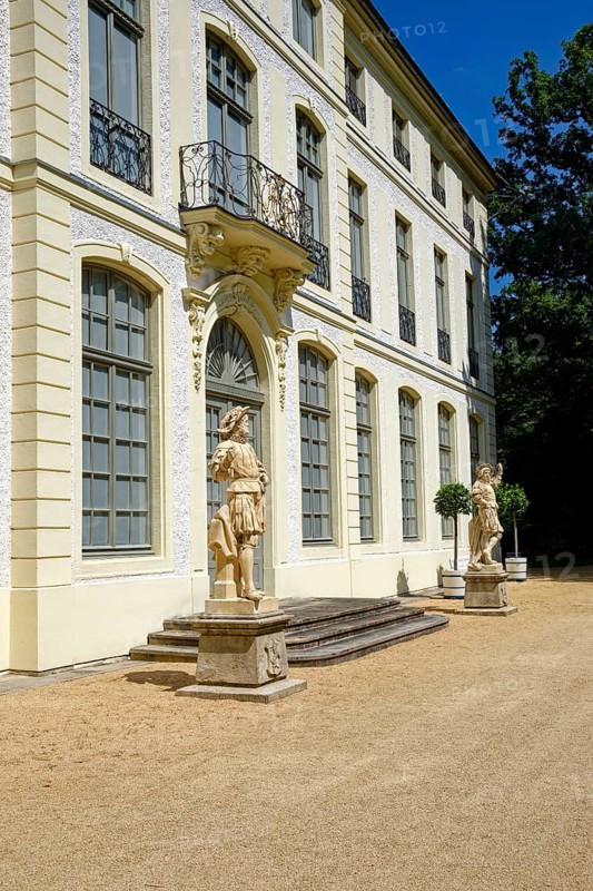 Main portal with two hunter figures, summer palace and park, residential town of Greiz, Thuringia, Germany, Europe