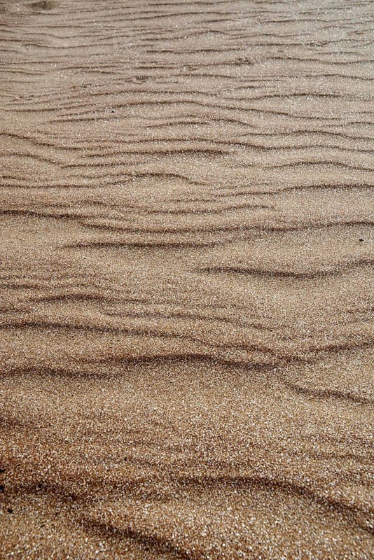 Brown-gold natural sand texture texture background, waves wallpaper background beach coast