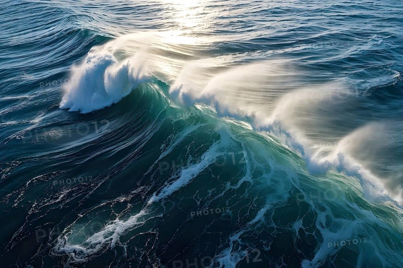 Aerial view of ocean wave cresting with foam water glistening under sunlight, AI generated