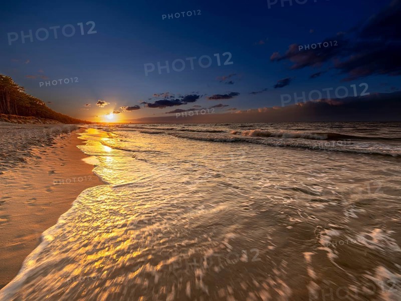 Sunset on a sandy beach on the island of Usedom on the Baltic Sea, Zempin, Mecklenburg-Western Pomerania, Germany, Europe
