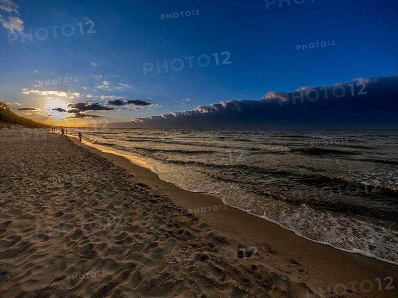 Sunset on a sandy beach on the island of Usedom on the Baltic Sea, Zempin, Mecklenburg-Western Pomerania, Germany, Europe