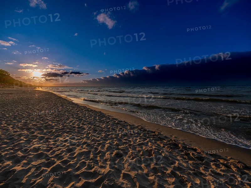 Sunset on a sandy beach on the island of Usedom on the Baltic Sea, Zempin, Mecklenburg-Western Pomerania, Germany, Europe